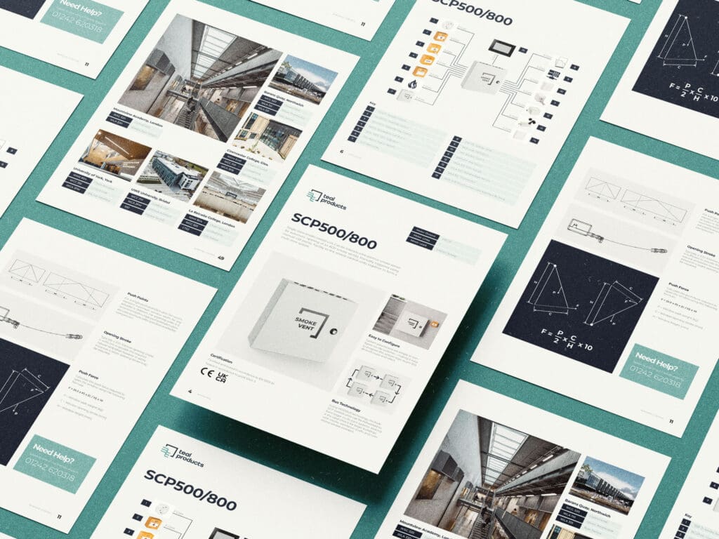 A display of professional architectural brochures and floor plans arranged on a teal surface. The brochures detail various building designs, showcasing photographs, technical diagrams, and innovative features such as natural ventilation systems.