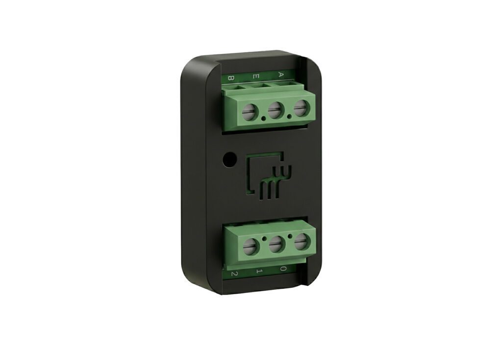A black rectangular electronic module with green terminal blocks on the top and bottom, featuring a central logo and four visible connection points.
