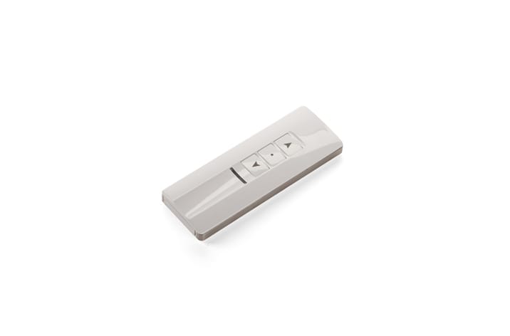 A white remote control with three buttons (up, down, and center) on a white background, ideal for controlling window actuators.